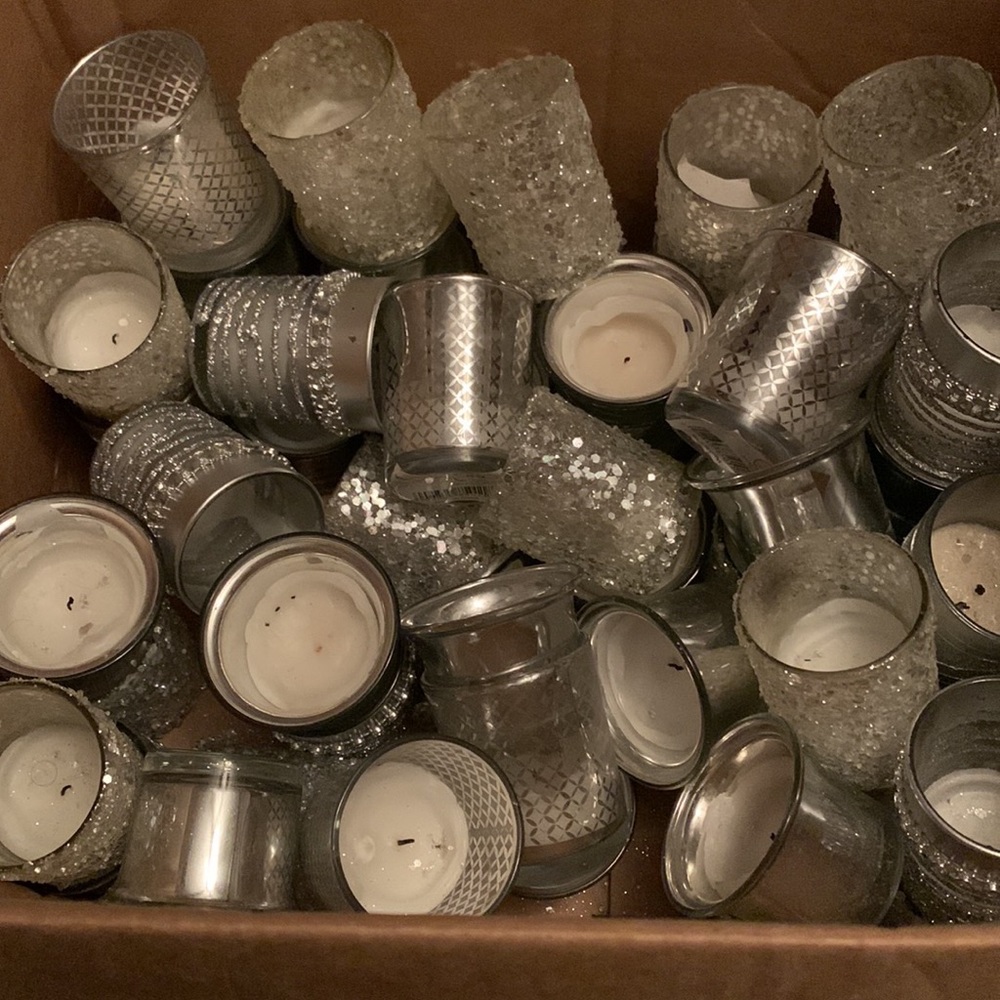 Used votive wedding table candles